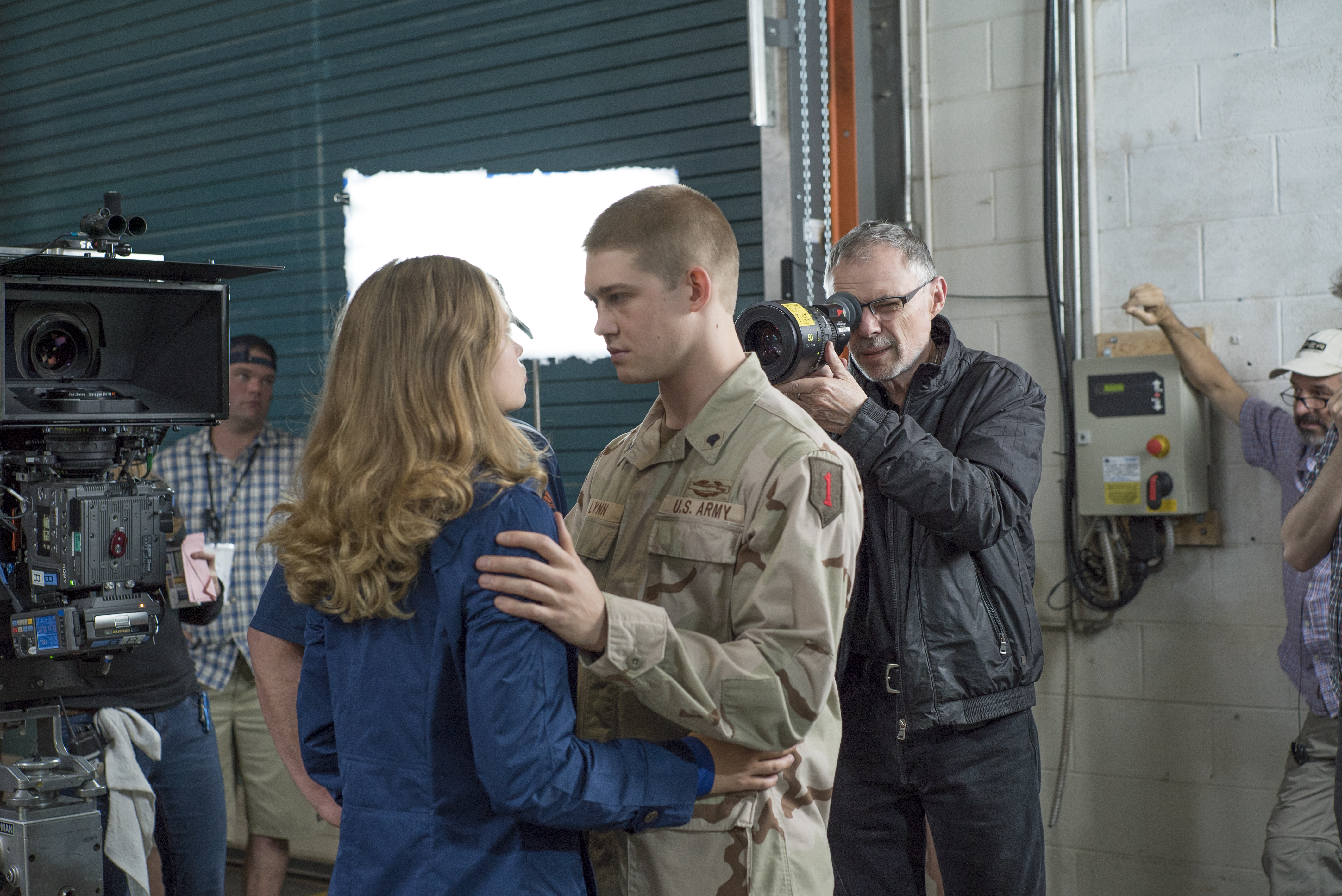 John Toll, ASC (right) lines up a shot on the set of Billy Lynn's Long Halftime Walk.