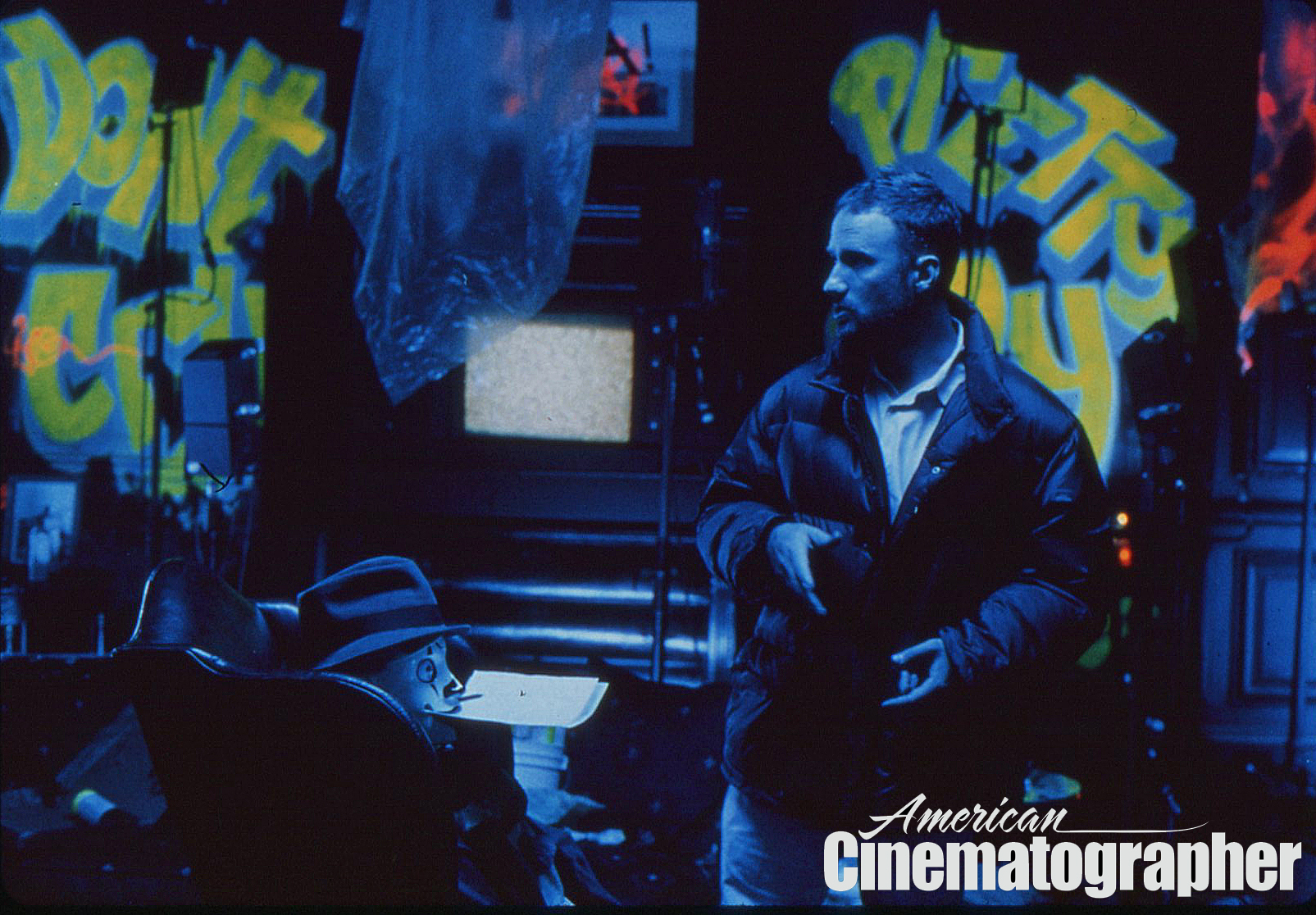Fincher inspects a UV-graffiti-covered room on location in the Filoli mansion — a famed landmark estate just outside of San Francisco — standing in as Van Orton’s mansion.