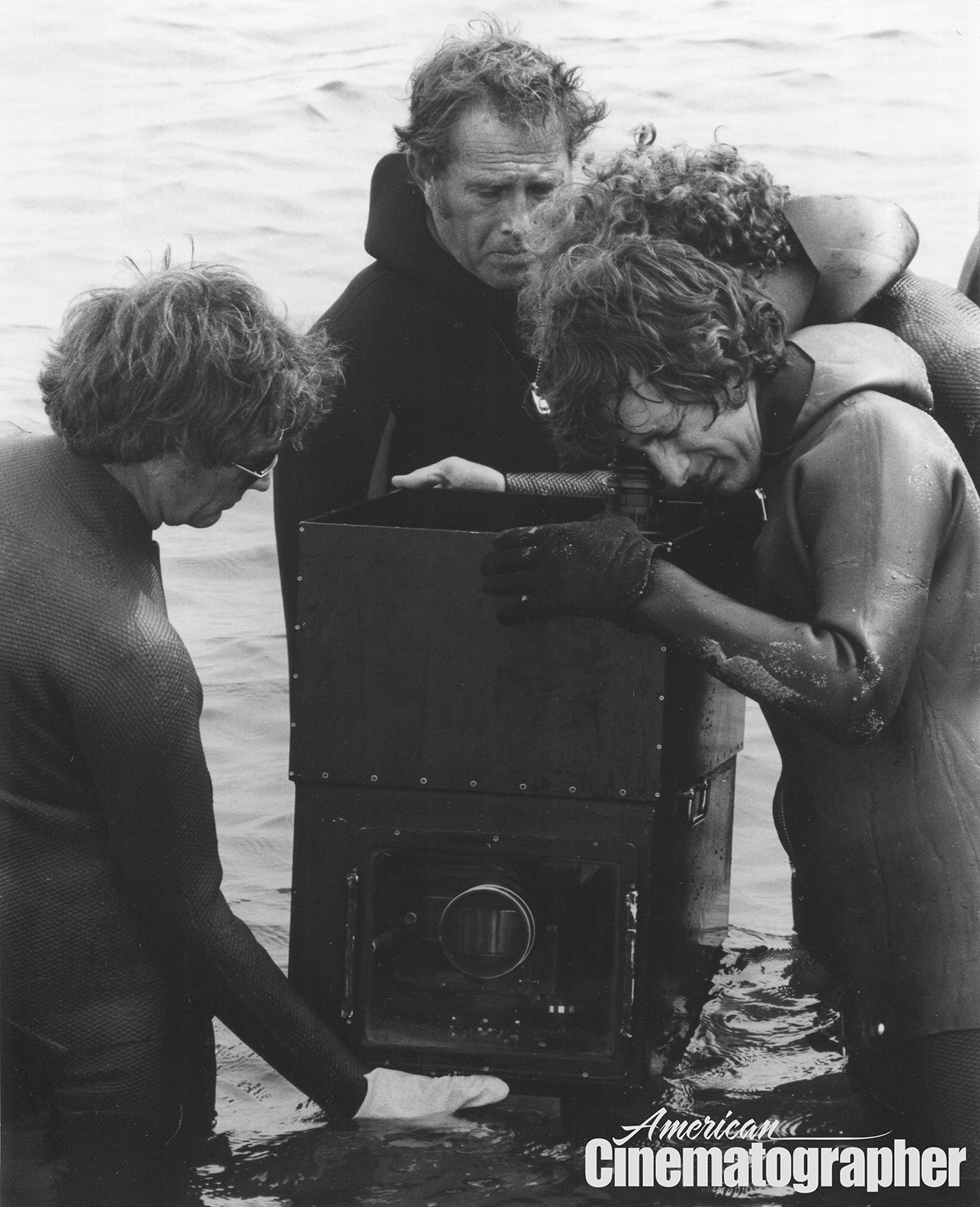Spielberg checks the frame while shooting at surface level.