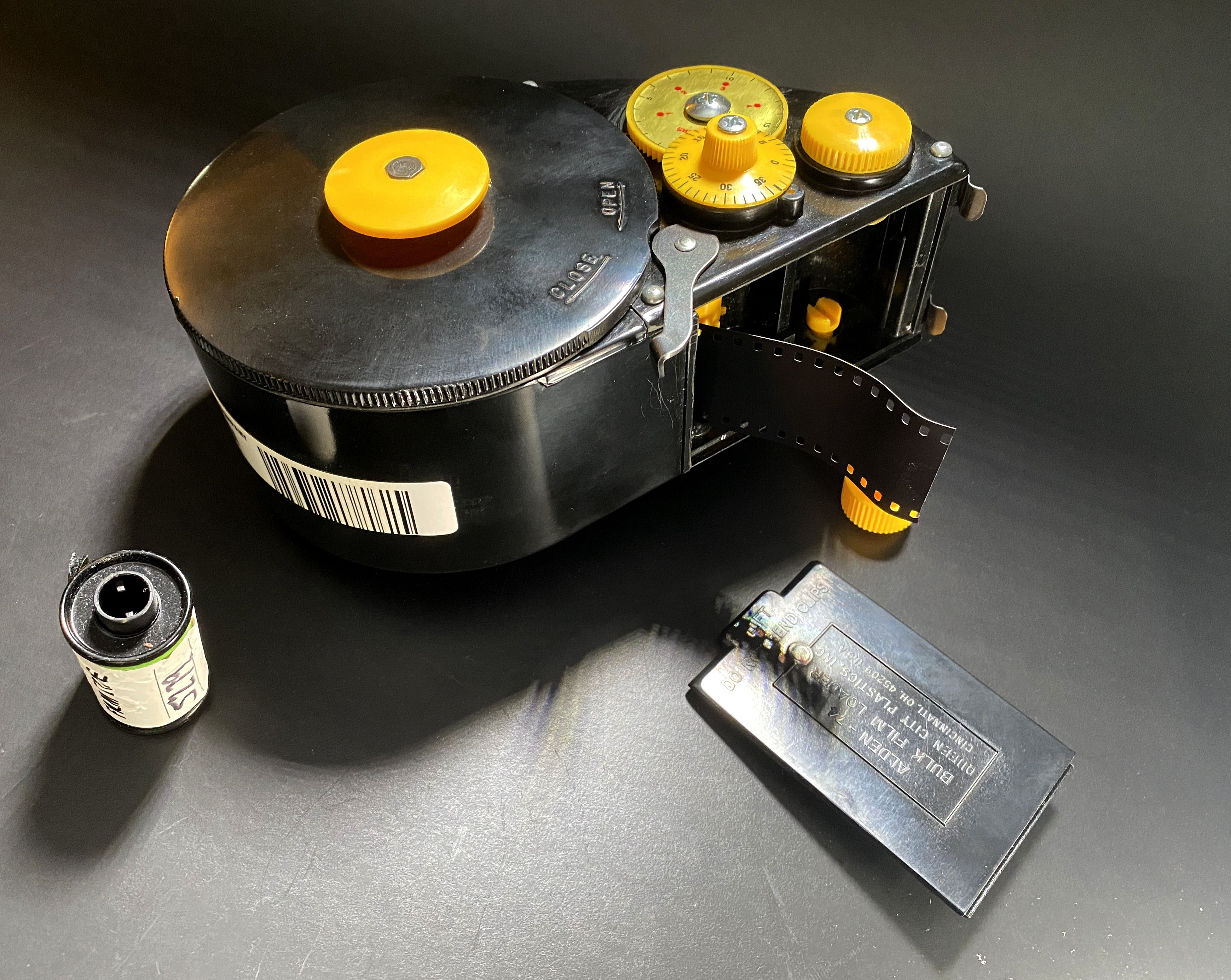 How to Open a 35mm Film Container 