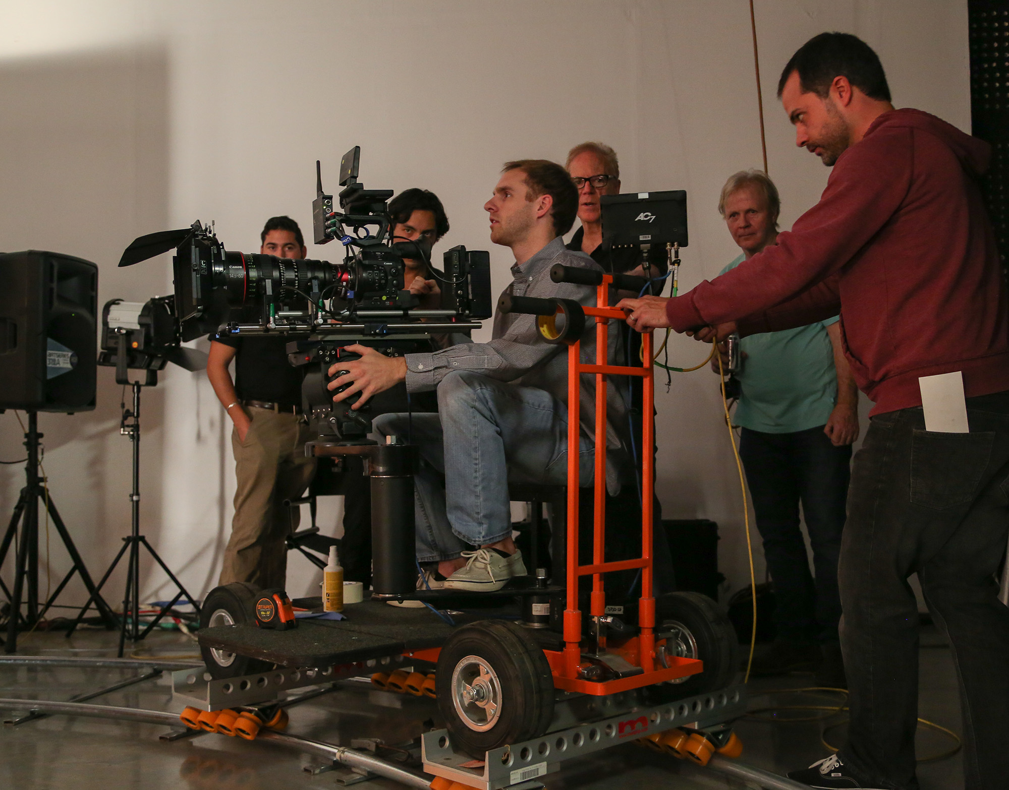 Crudo and Kenny (in background) watch students execute a dolly move. (Photo: Alex Beatty)