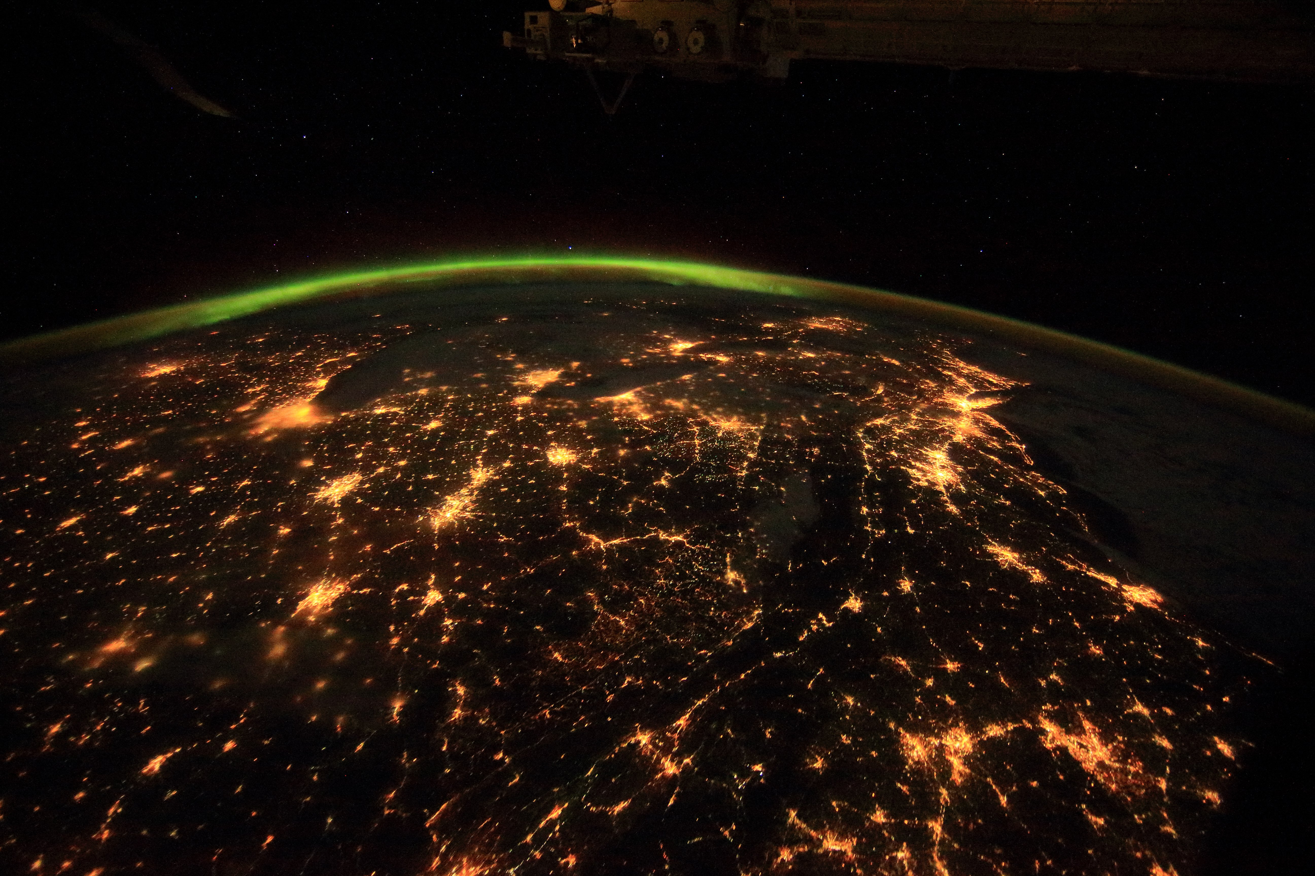 A nocturnal view of city lights from aboard the ISS, as seen in the IMAX film A Beautiful Planet.