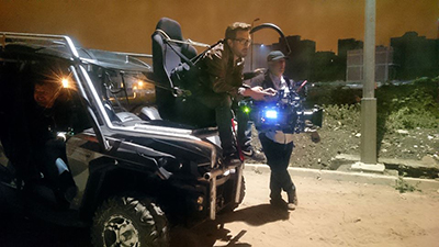 From left: First AC Iurie Bustiuc (inside tracking car); cinematographer Bjorn Charpentier, SBC; and 1st AD Ahmed Hatimi on location in Tangier, Morocco, for High Wire Act.